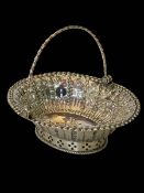 George III silver swing handle basket by Richard Meach, London 1771, 15cm across.