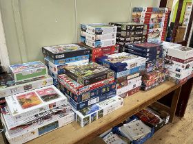 Large collection of jigsaw puzzles including Trefl, Castorland, Wasqij, etc.