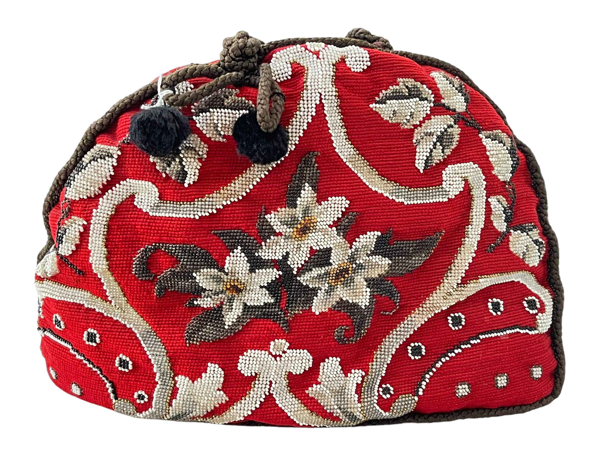 Beaded ware red tea cosy.