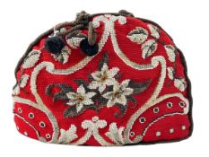 Beaded ware red tea cosy.