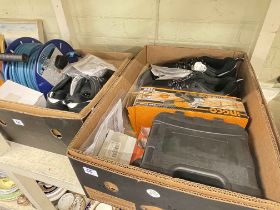 Two boxes of power tools including angle grinders and drills, two pairs of as new safety trainers,