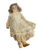 Bisque head doll with sleeping eyes, impressed 192 9.