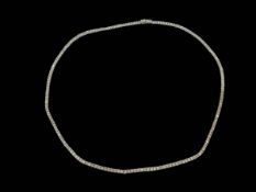 18 carat white gold and diamond tennis necklace, total diamond content 4.27 carats.