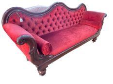 Victorian mahogany double scroll end settee with serpentine arched back in wine coloured deep