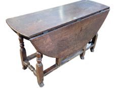 19th Century oak gateleg dining table on turned legs, 118cm by 119cm by 65cm open.