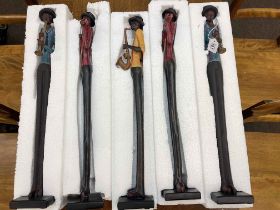 Set of five tall contemporary jazz band figures.