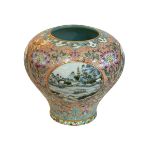Chinese famille rose vase decorated with landscape panels, Quinlong mark to base, 13cm.