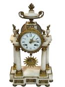 Ornate gilt and alabaster mantel clock with finial, 42cm.