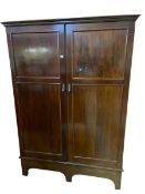 Mahogany compactum double door wardrobe with fitted interior, 193cm by 137cm by 54cm.