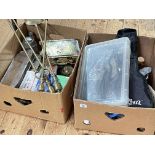 Two boxes of metalwares, porcelain, costume jewellery, tins, football programme, etc.