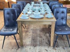 Barker & Stonehouse Flagstone extending dining table and six leather look tubular framed chairs,