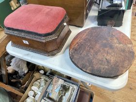 Rustic hardwood bread board on four feet and a mahogany box stool.