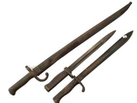 Three bayonets including R Stock & Co, Berlin.