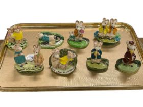 Eight Beswick Kitty McBride figurines.
