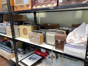 Collection of vintage radios, cassette players, car radios, etc.