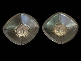Pair of silver golf medals set in pewter dishes, Holmes Ramsden c1912.