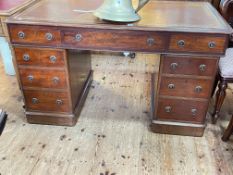 Late Victorian twin pedestal mahogany desk with brown leather inset top, 76cm by 136cm by 79cm.