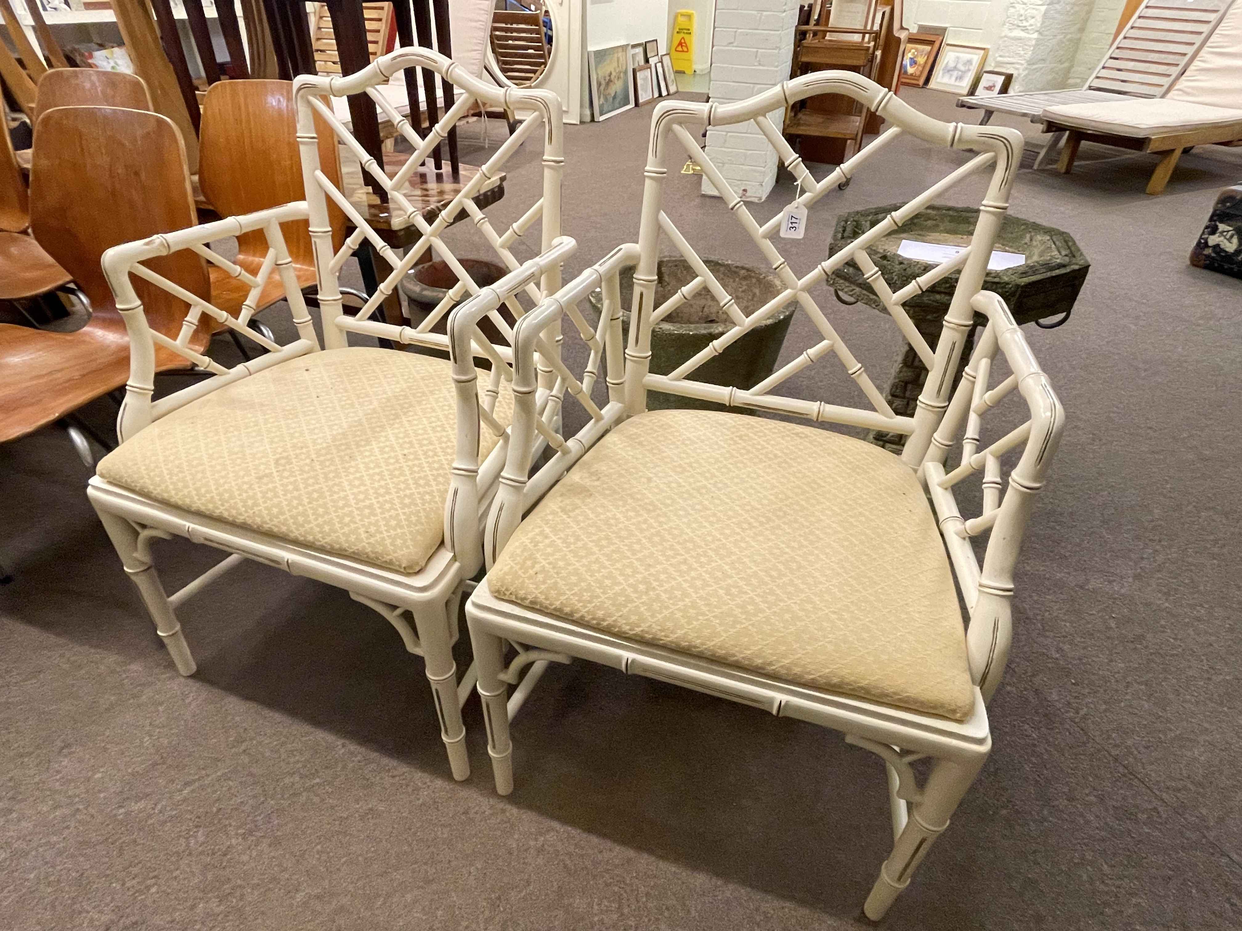 Pair painted simulated bamboo occasional armchairs.
