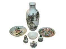 Chinese bird decorated vase, two saucer dishes, small bowl and three opium bottles.