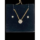 One carat diamond pendant necklace with 14k gold chain, together with diamond ear studs.