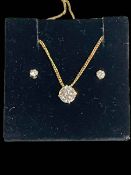 One carat diamond pendant necklace with 14k gold chain, together with diamond ear studs.