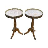 Pair Continental marble inset top and gilt mounted tripod wine tables, 57.5cm by 34cm diameter.