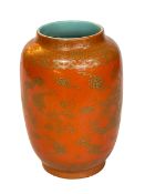 Chinese orange glazed vase decorated with gilt painted dragons with Jiaqing mark to base, 20cm high.