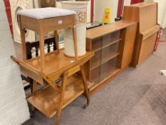 Teak two door bureau, teak sliding glazed door cabinet bookcase, dinner wagon,