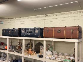 Three various vintage travelling trunks.