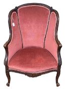 Carved French canape with serpentine front seat in rose pink draylon.