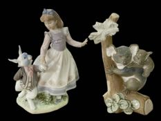 Two Lladro figurines, Alice in Wonderland and Koala's, both with boxes.