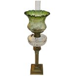 Vintage brass columned oil lamp with green shade, 74cm.