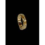 Diamond set 18 carat gold band ring, size K.