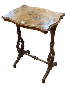 Victorian burr walnut shaped top occasional table on openwork ends joined by turned stretcher,
