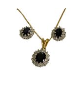 Sapphire and diamond oval pendant 18 carat gold necklace, with matching earrings.