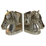 Pair of composite silver coloured horse head bookends, 23cm.