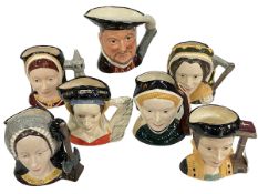 Seven Royal Doulton character jugs, Henry VIII and Six Wives.