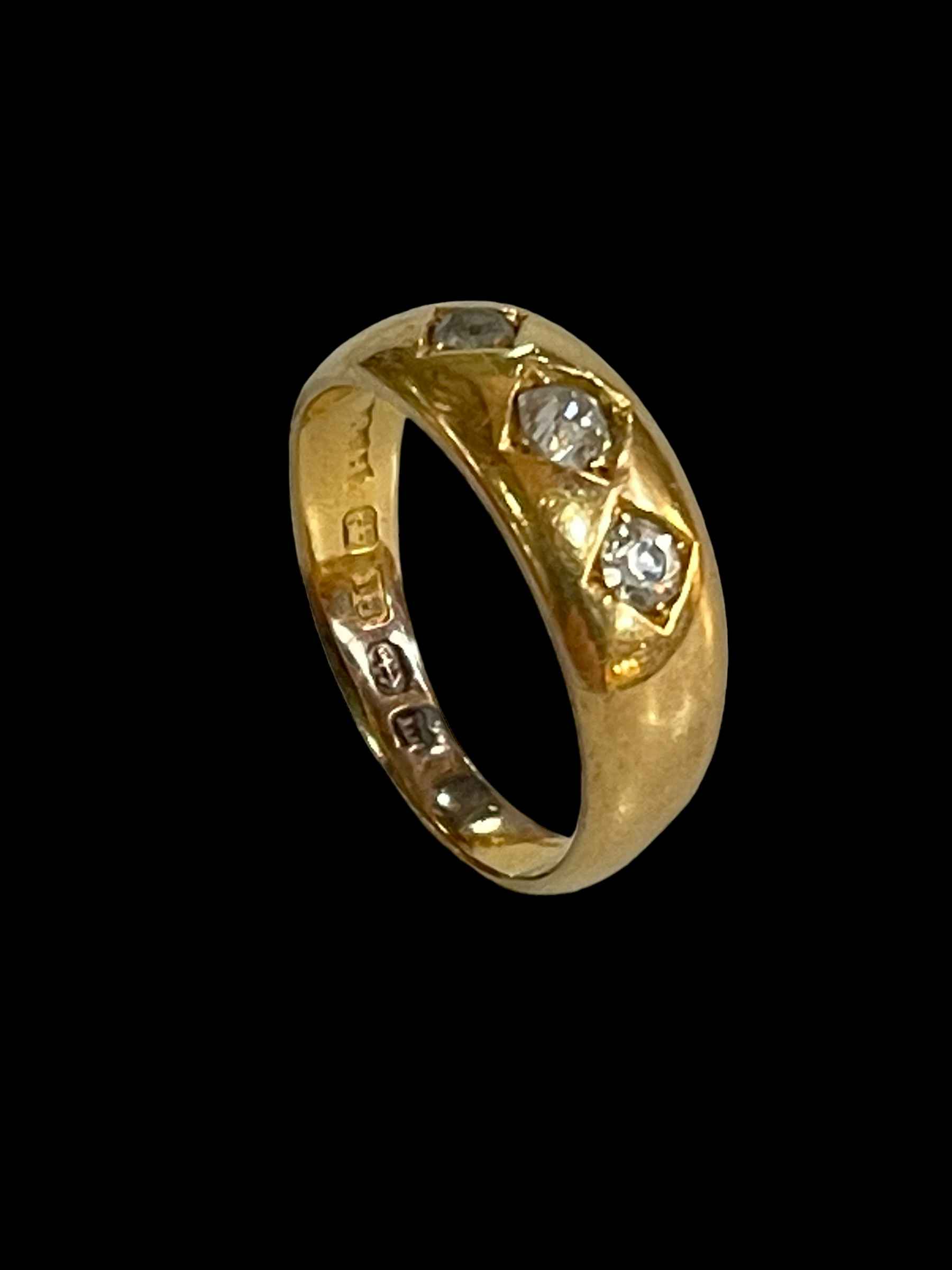 18 carat gold three stone diamond ring, size L.