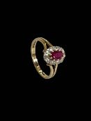 Ruby and diamond 9 carat gold ring, size O.