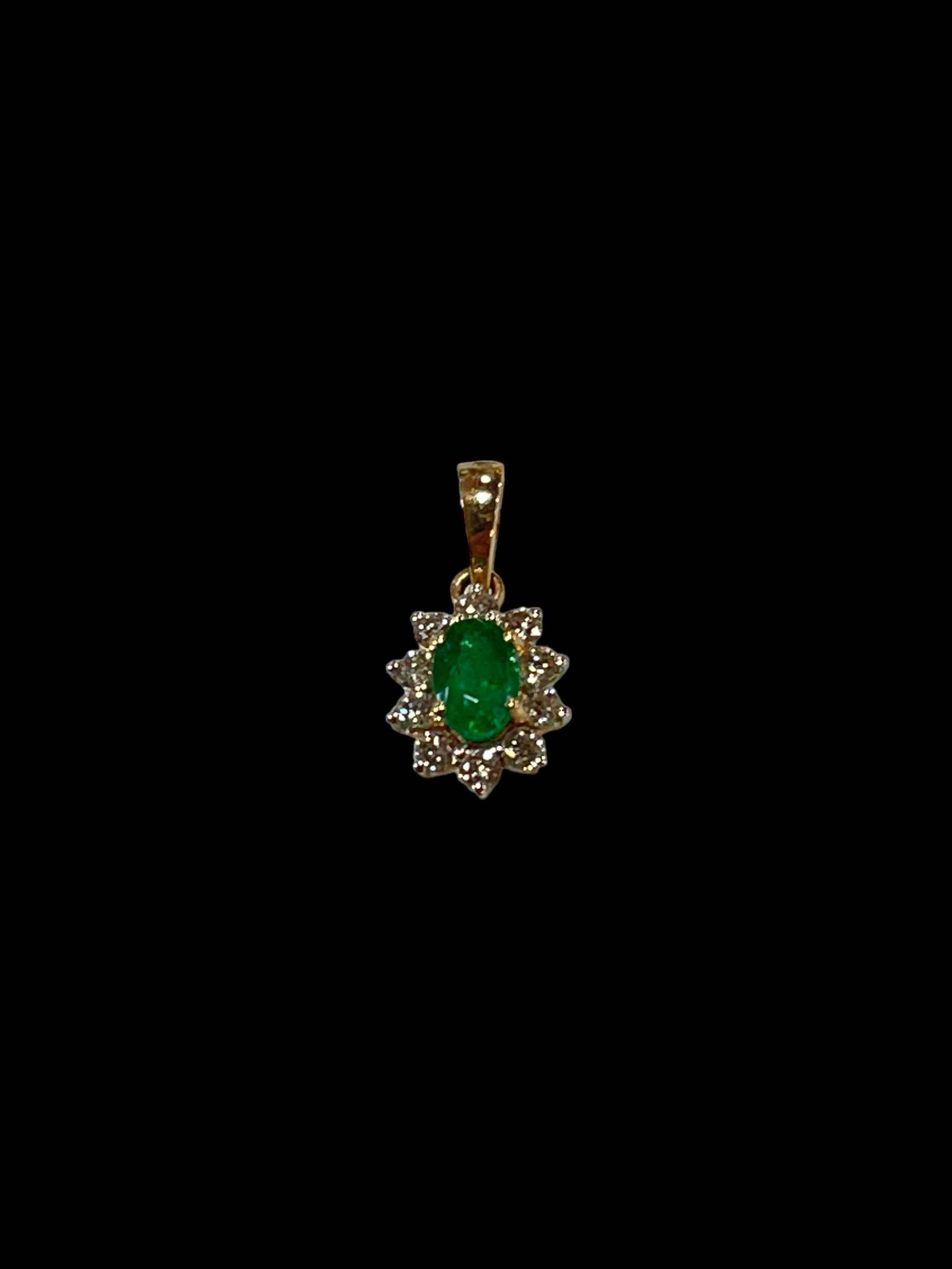 Emerald and diamond cluster pendant set in 18 carat yellow gold, emerald 0.55 carats, diamond 0.