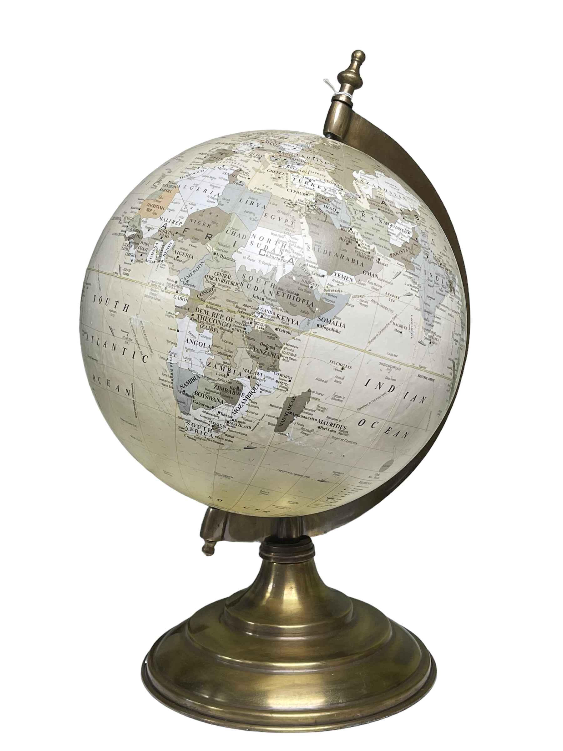 World globe on brass stand.