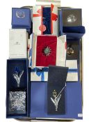 Collection of boxed Swarovski Crystal ornaments.