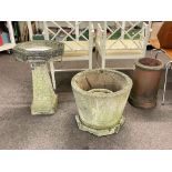 Octagonal weathered bird bath on tapering pedestal,