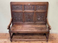 Oak triple carved panel back hall bench, 114cm by 114cm by 51cm.