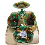 Wedgwood Majolica tazza with fish triform base, two shell shaped dishes and plate.