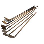 Collection of hickory shafted golf clubs.