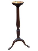 Mahogany fluted column triform torchere, 118.5cm by 26cm diameter.