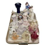 Nine various Coalport figures, Franklin Mint figure and ships decanter.