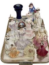 Nine various Coalport figures, Franklin Mint figure and ships decanter.