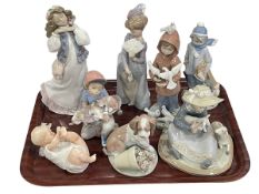 Seven Lladro figurines and Bisque Baby Lladro including Dreams of Summer Past, Constance,